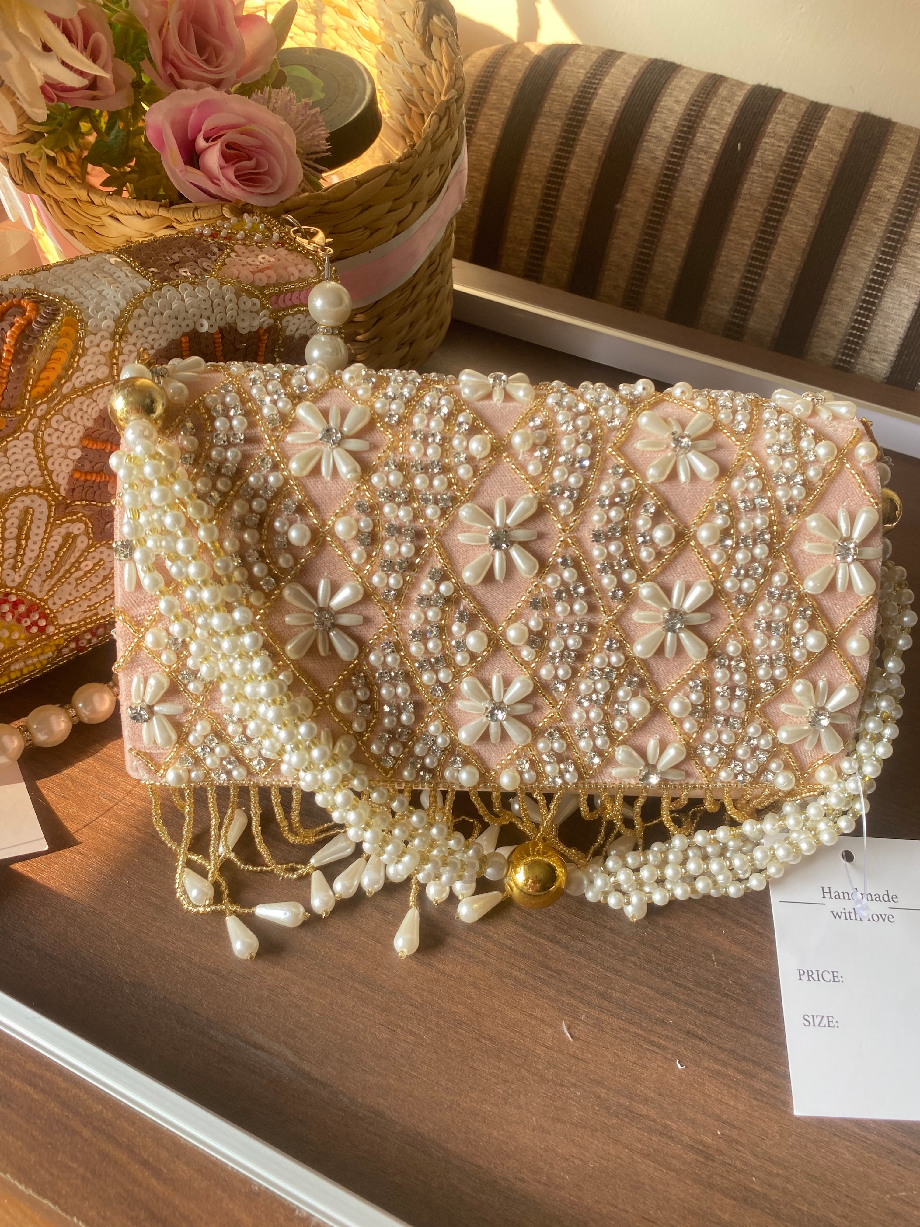 Peach pearl clutch