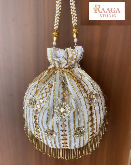 Mirror magic ivory potli