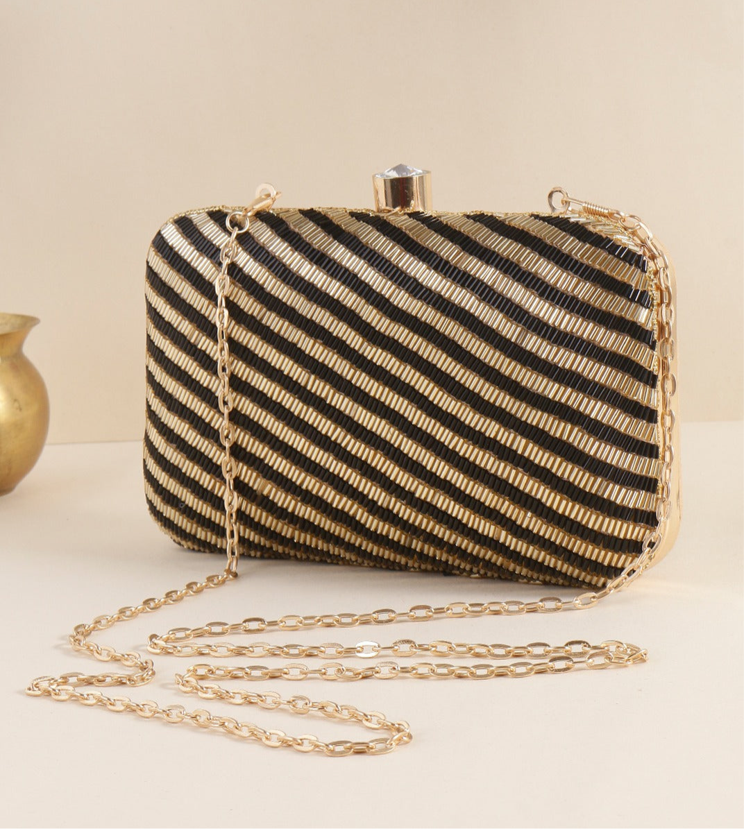 Gold and black clutch