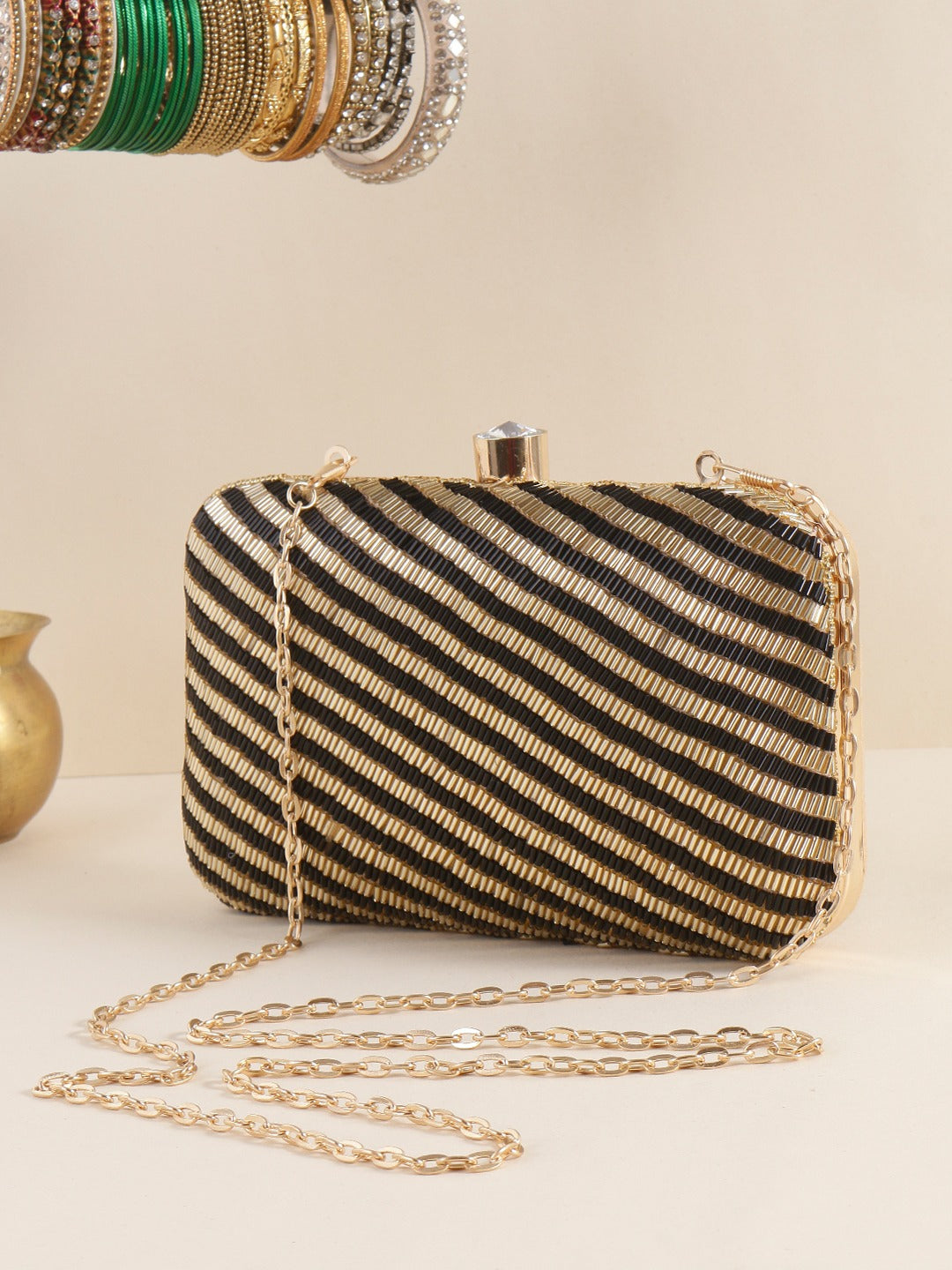 Gold and black clutch