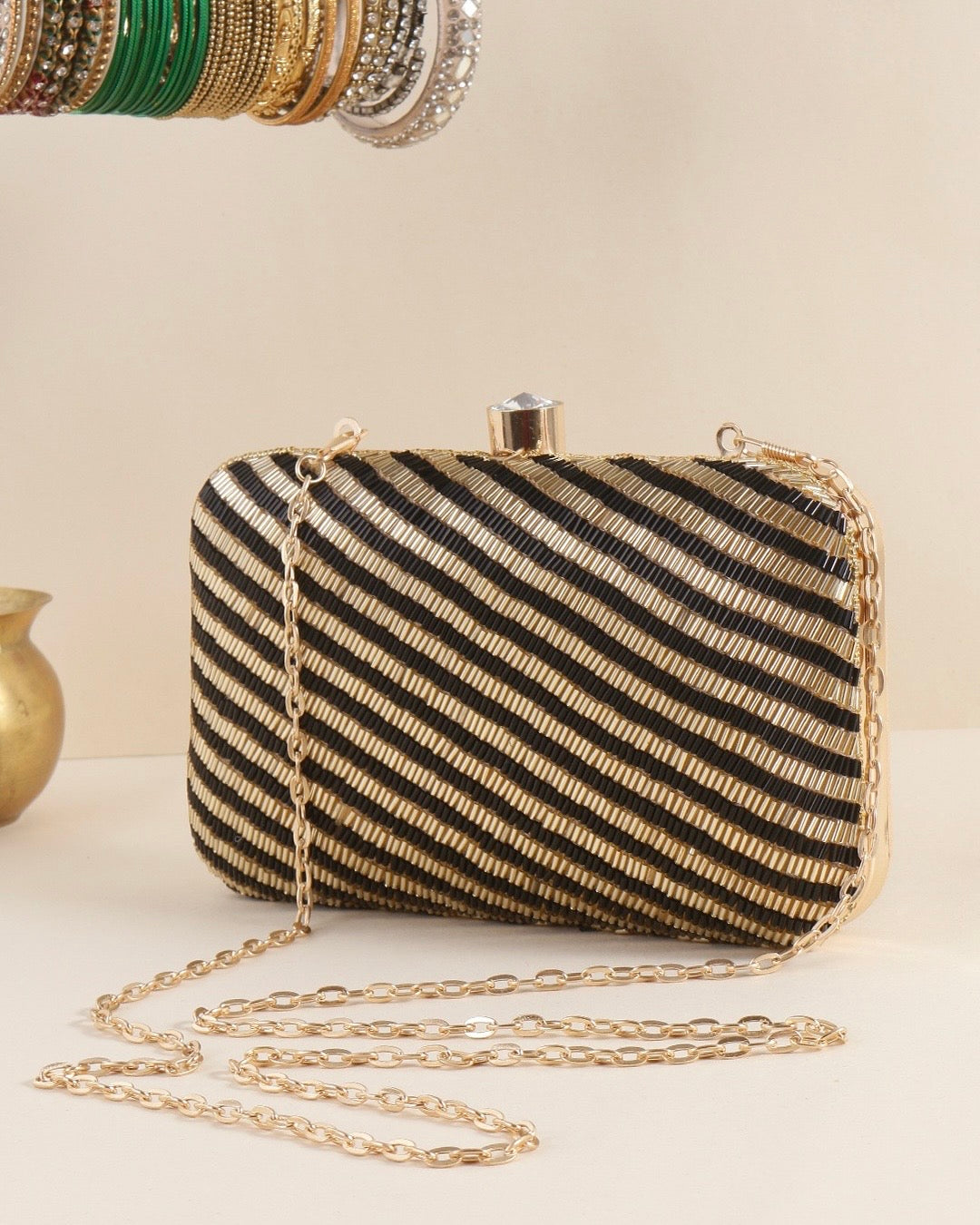 Gold and black clutch