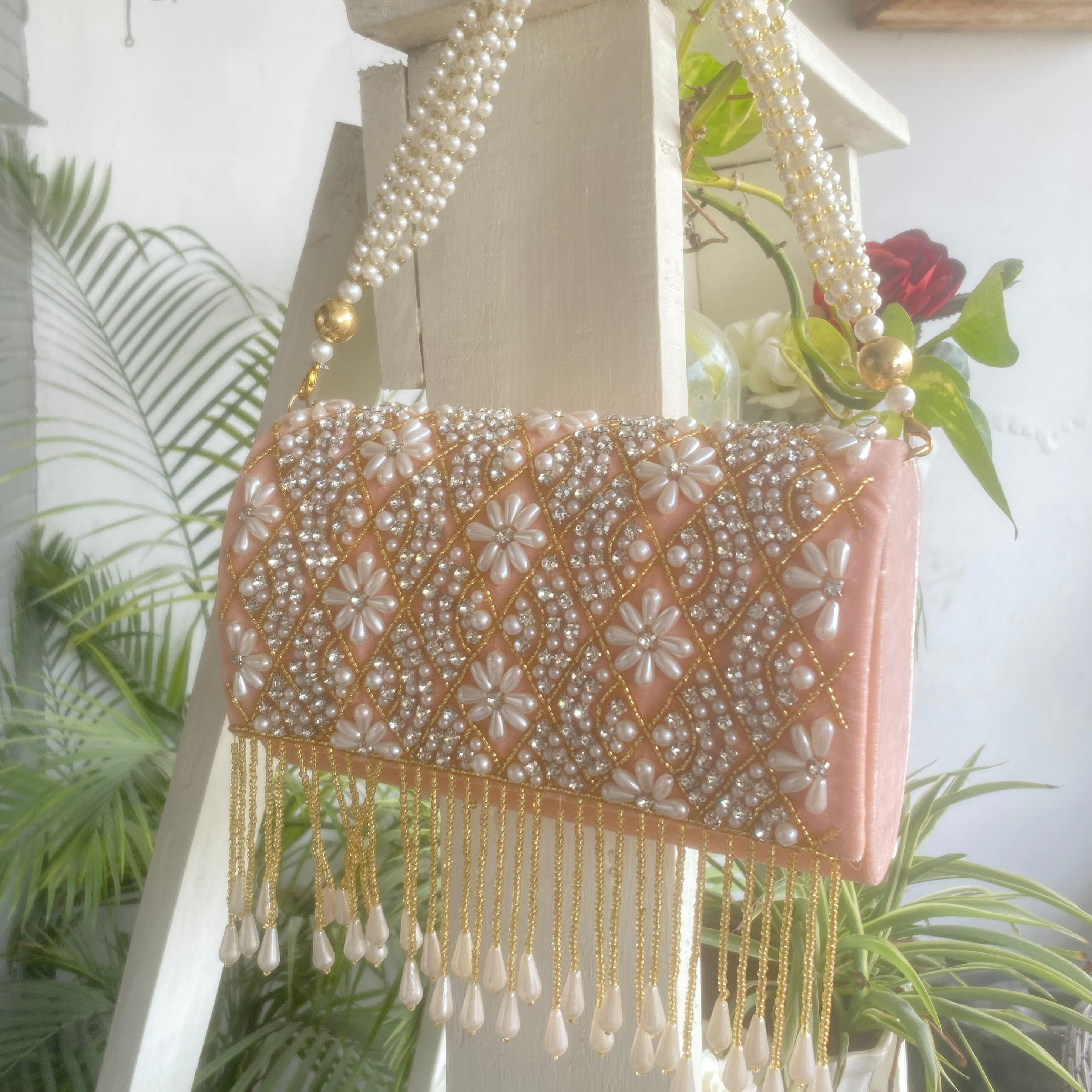 Peach pearl clutch