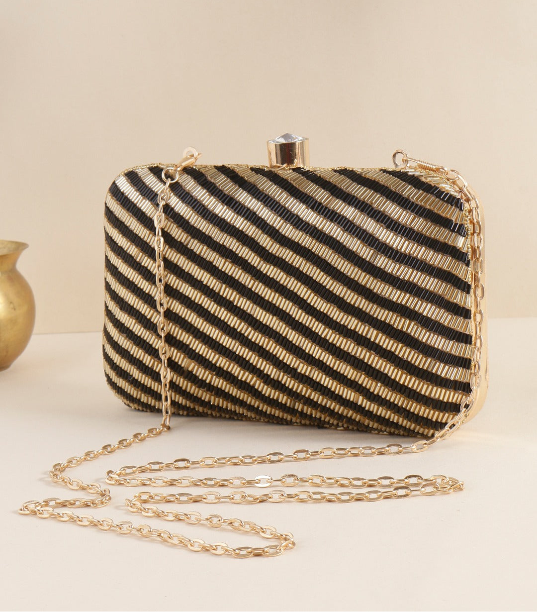 Gold and black clutch