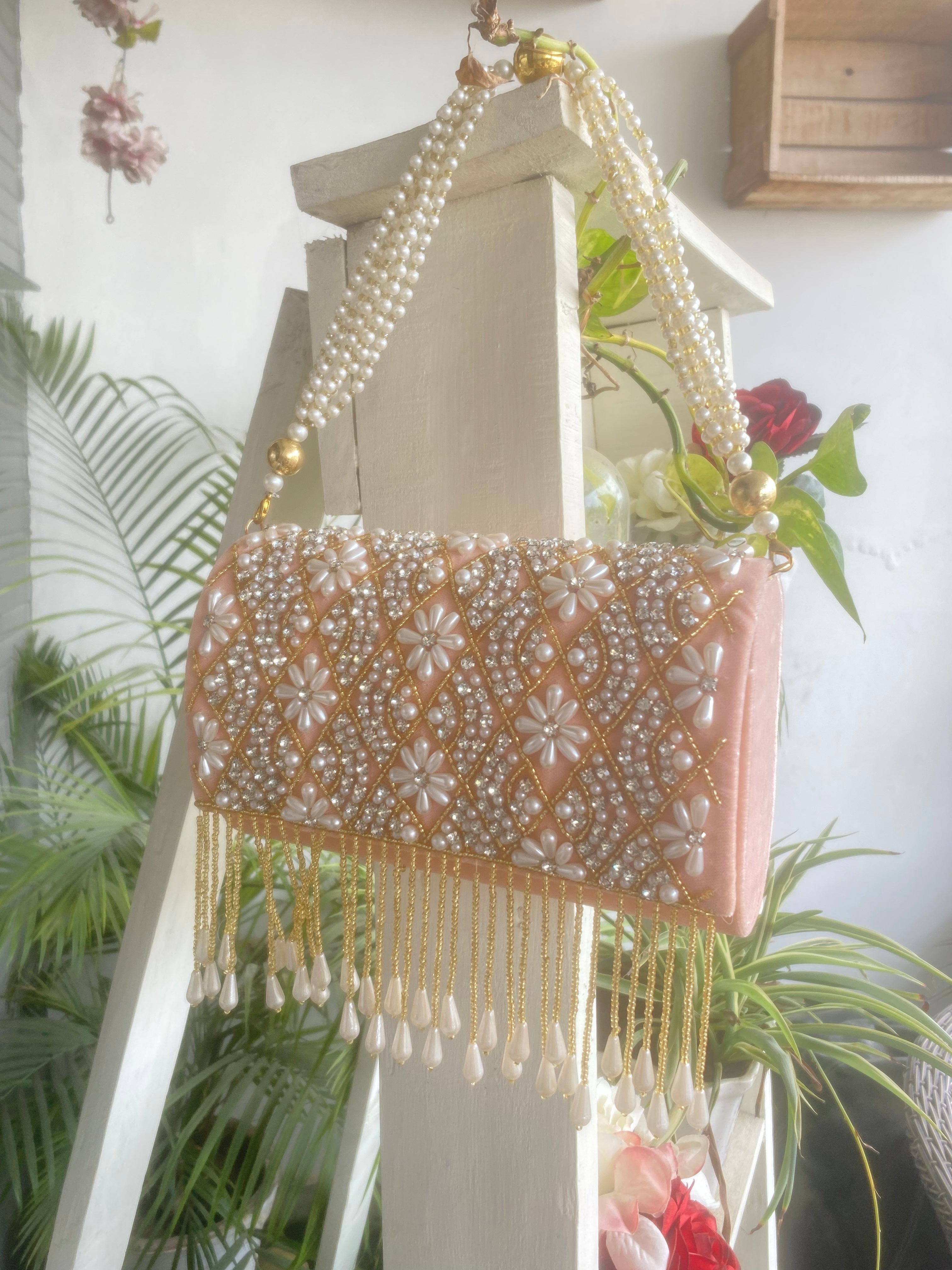 Peach pearl clutch