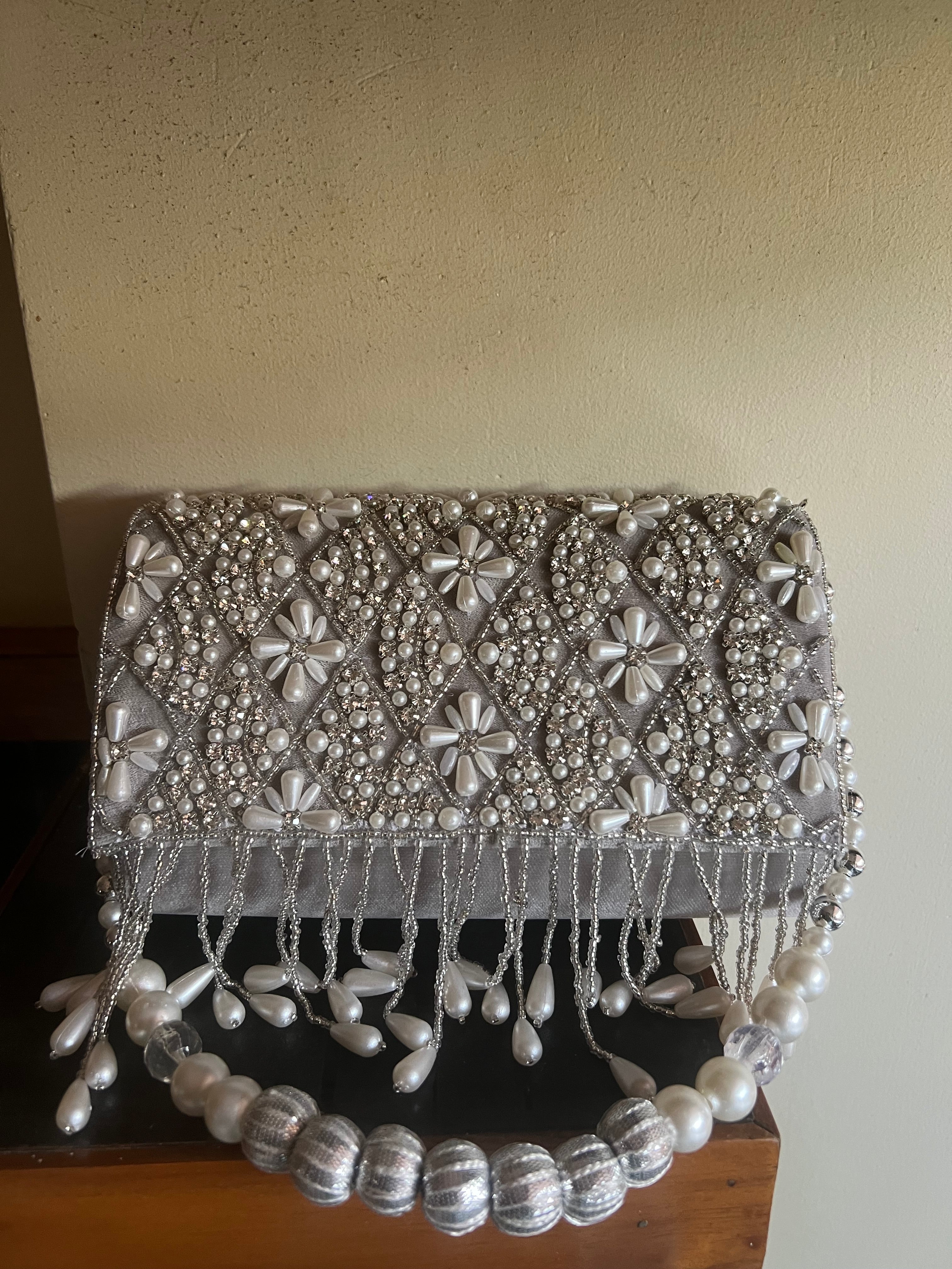 Grey pearl clutch